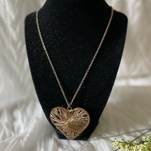Gold tone wire wrapped heart pendant with very long chain necklace